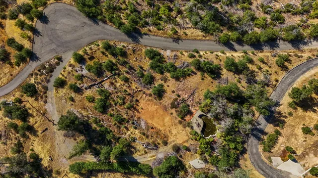 a view of a road with a yard