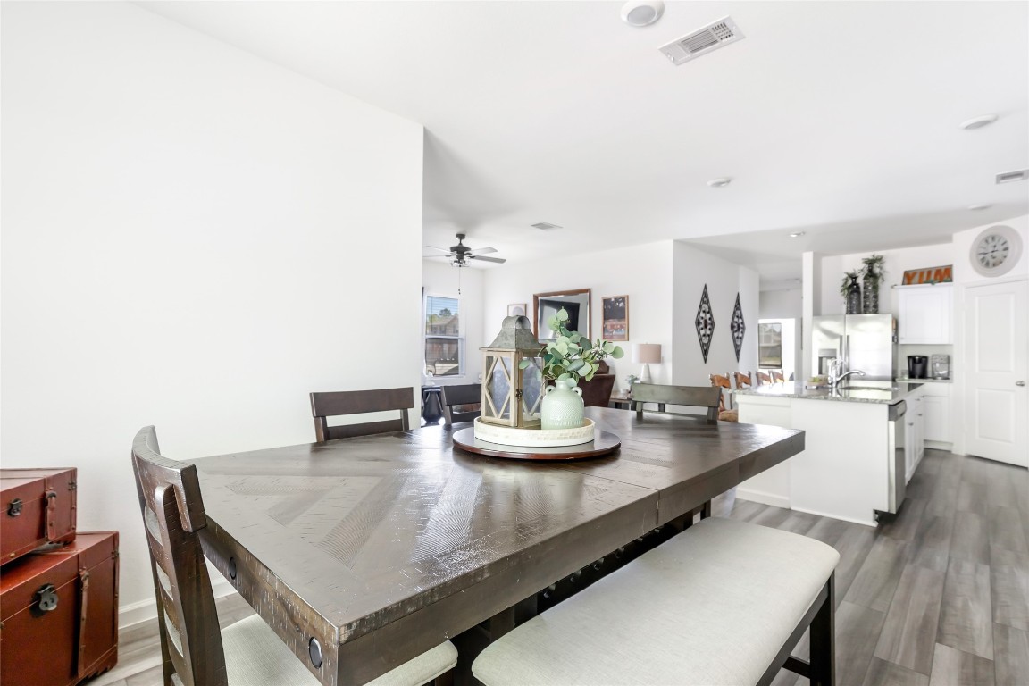 28319 Peppard Lane Huffman, TX 77336 - Photo 11 of 30 a view of a dining room with furniture and wooden floor