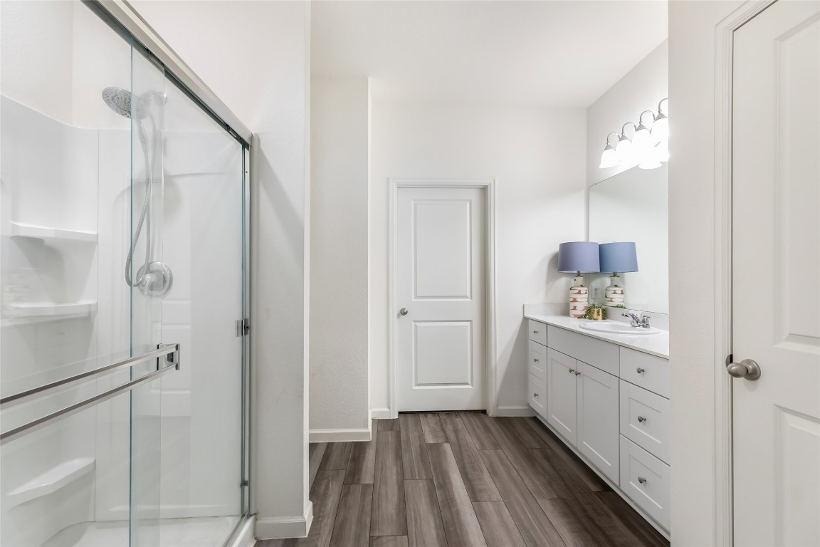 28319 Peppard Lane Huffman, TX 77336 - Photo 20 of 30 a bathroom with a sink and a mirror