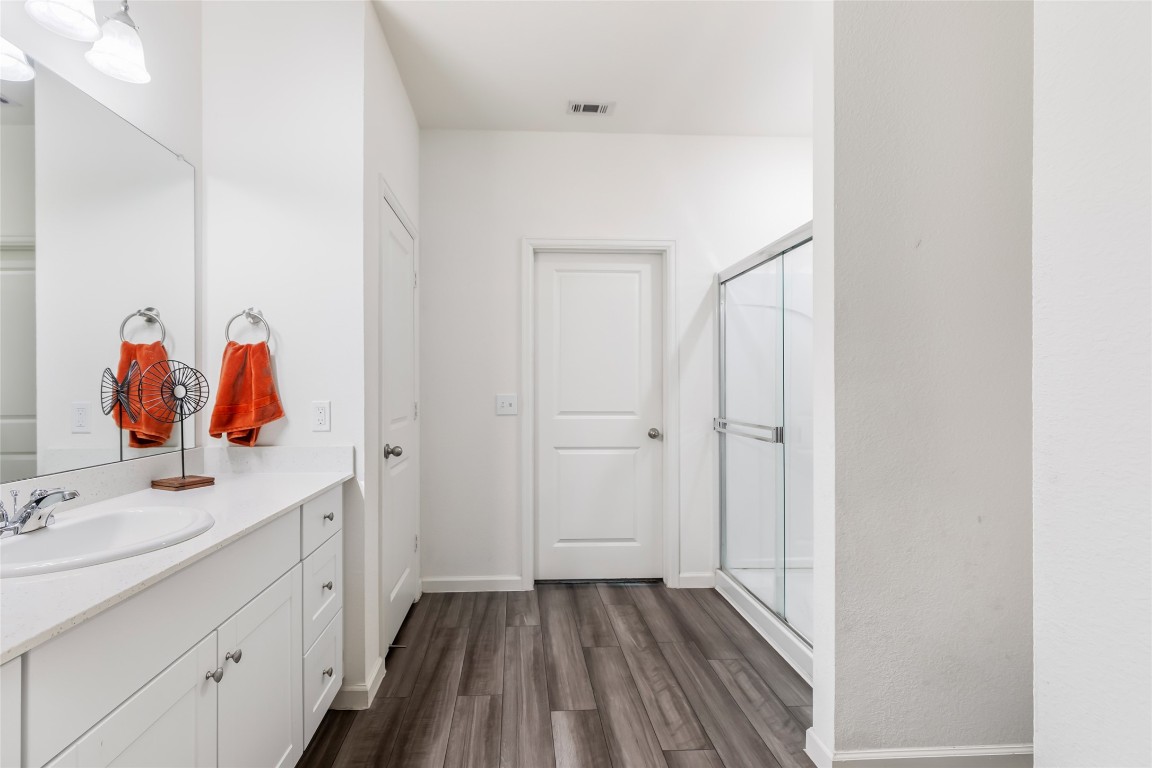 28319 Peppard Lane Huffman, TX 77336 - Photo 21 of 30 a bathroom with a sink and a mirror
