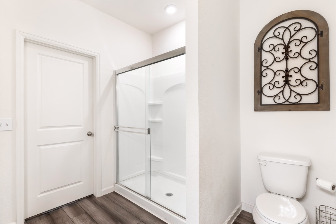 28319 Peppard Lane Huffman, TX 77336 - Photo 22 of 30 a bathroom with a toilet and a shower