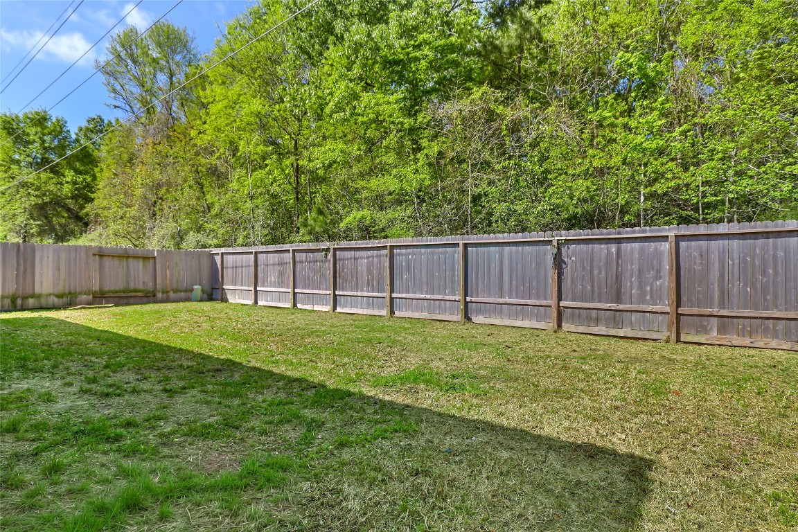 28319 Peppard Lane Huffman, TX 77336 - Photo 24 of 30 a yard with a fences