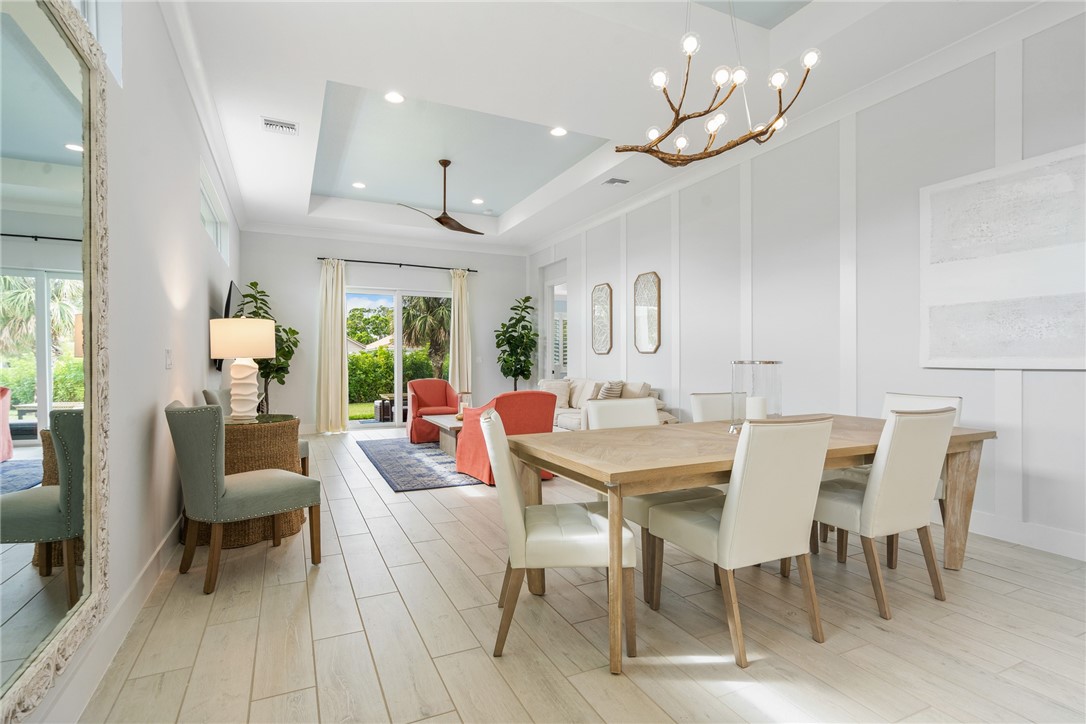 2159 Falls Manor Vero Beach, FL 32967 - Photo 1 of 36 a view of a dining room with furniture