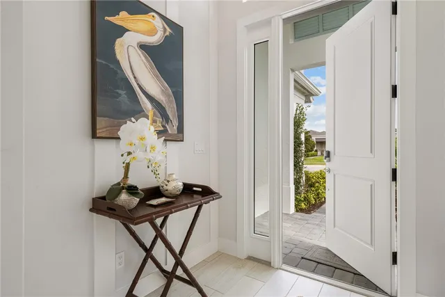 a view of entryway with furniture and stairs