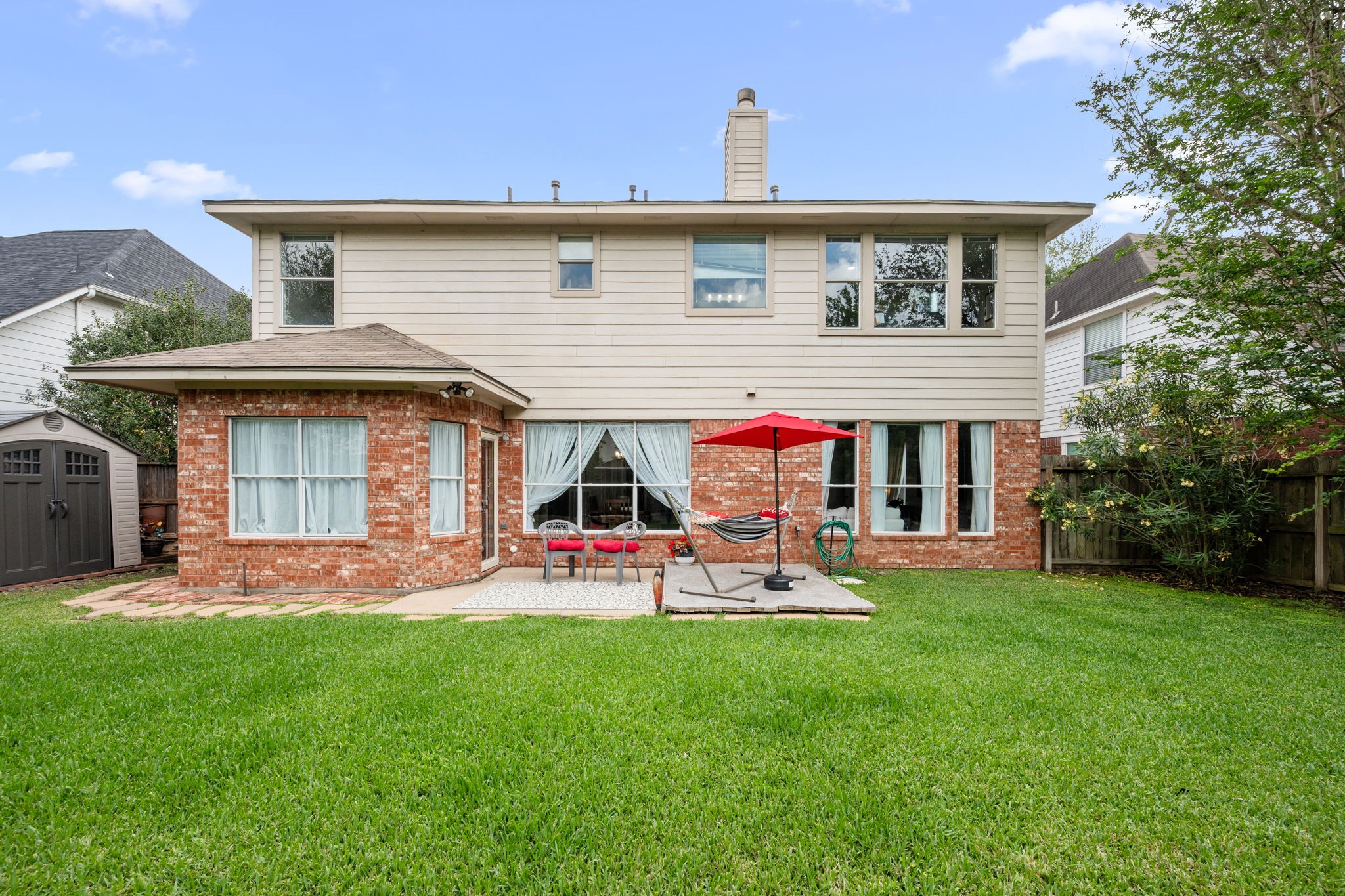 814 Legend Spring Drive Katy, TX 77494 - Photo 27 of 30 All that's missing here is you and your grill! This yard is ready for a summer of housewarming festivities.