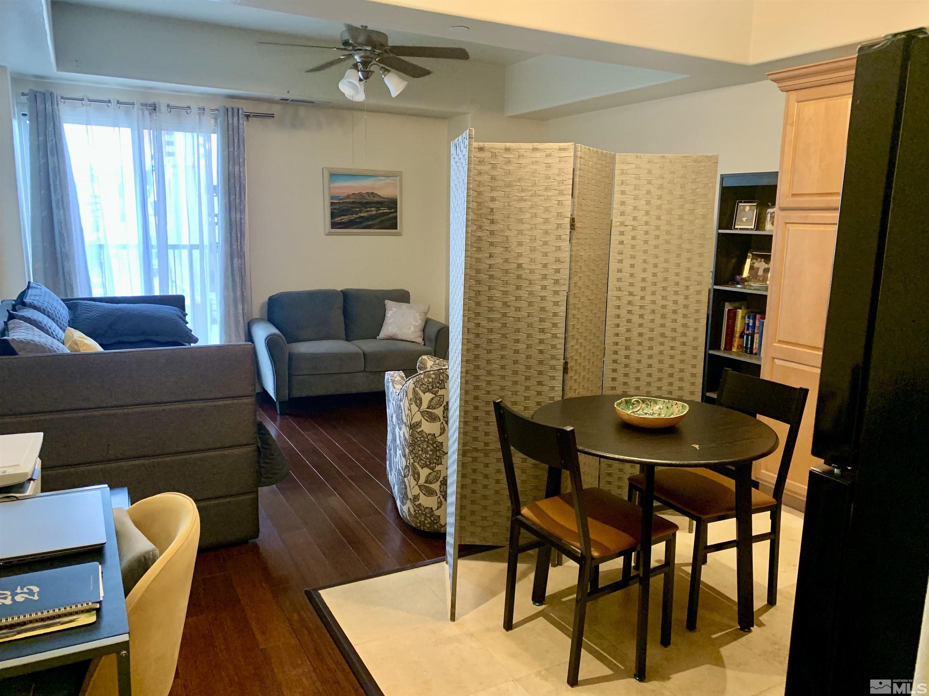 200 West 2nd Street, Unit 404 Reno, NV 89501 - Photo 13 of 30 a living room with furniture and a window
