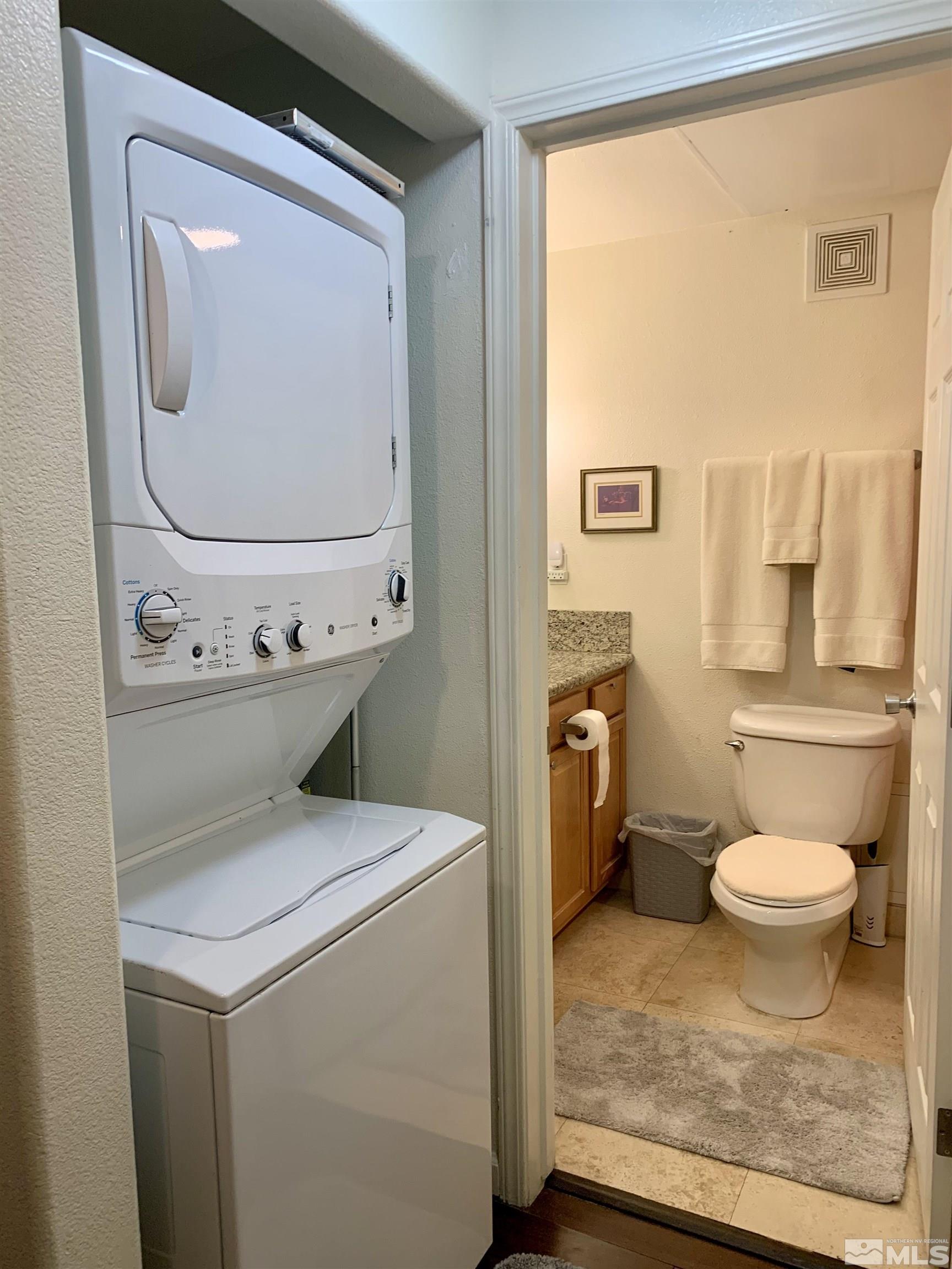 200 West 2nd Street, Unit 404 Reno, NV 89501 - Photo 16 of 30 a utility room with dryer and washer