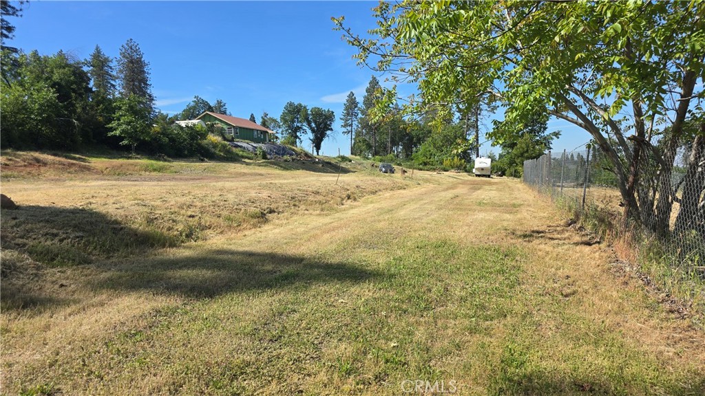 3810 Honey Run Road Paradise, CA 95969 - Photo 12 of 20 a view of a yard with a house
