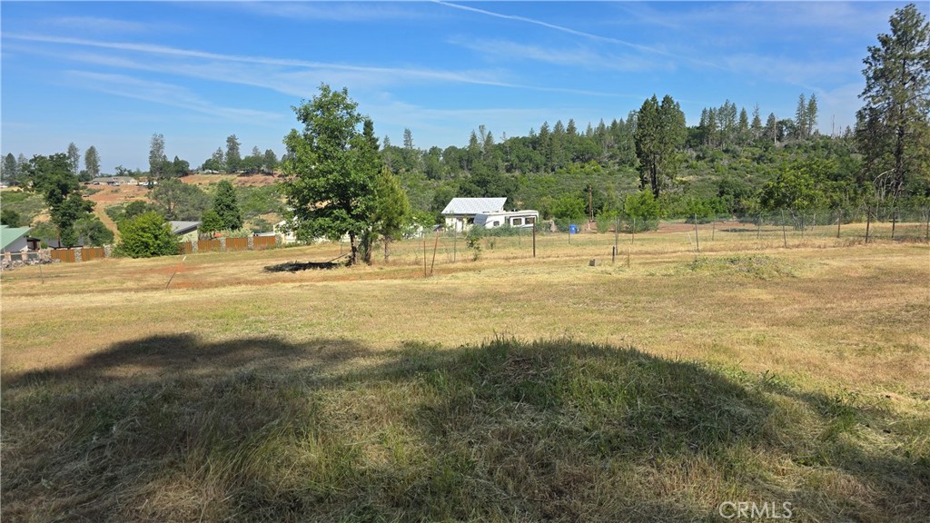 3810 Honey Run Road Paradise, CA 95969 - Photo 14 of 20 a swimming pool with an outdoor space and seating area