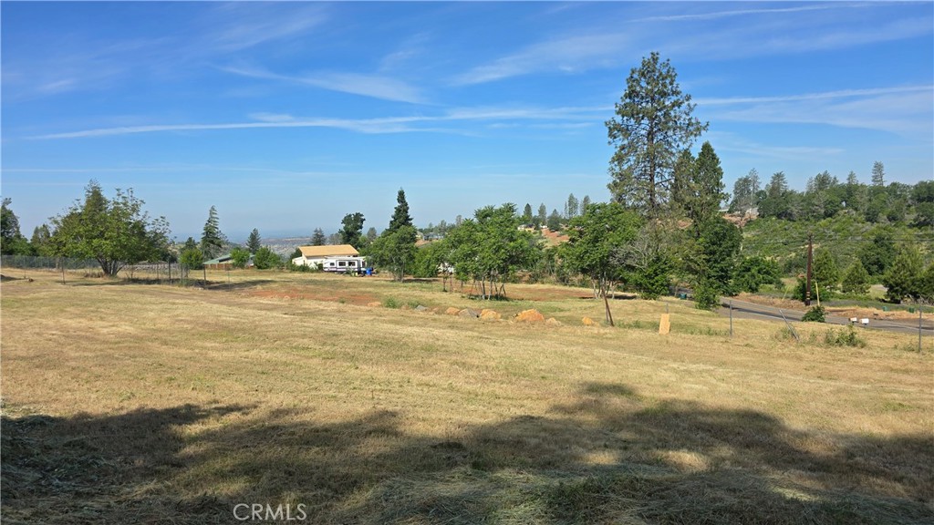 3810 Honey Run Road Paradise, CA 95969 - Photo 7 of 20 a view of a lake with a yard
