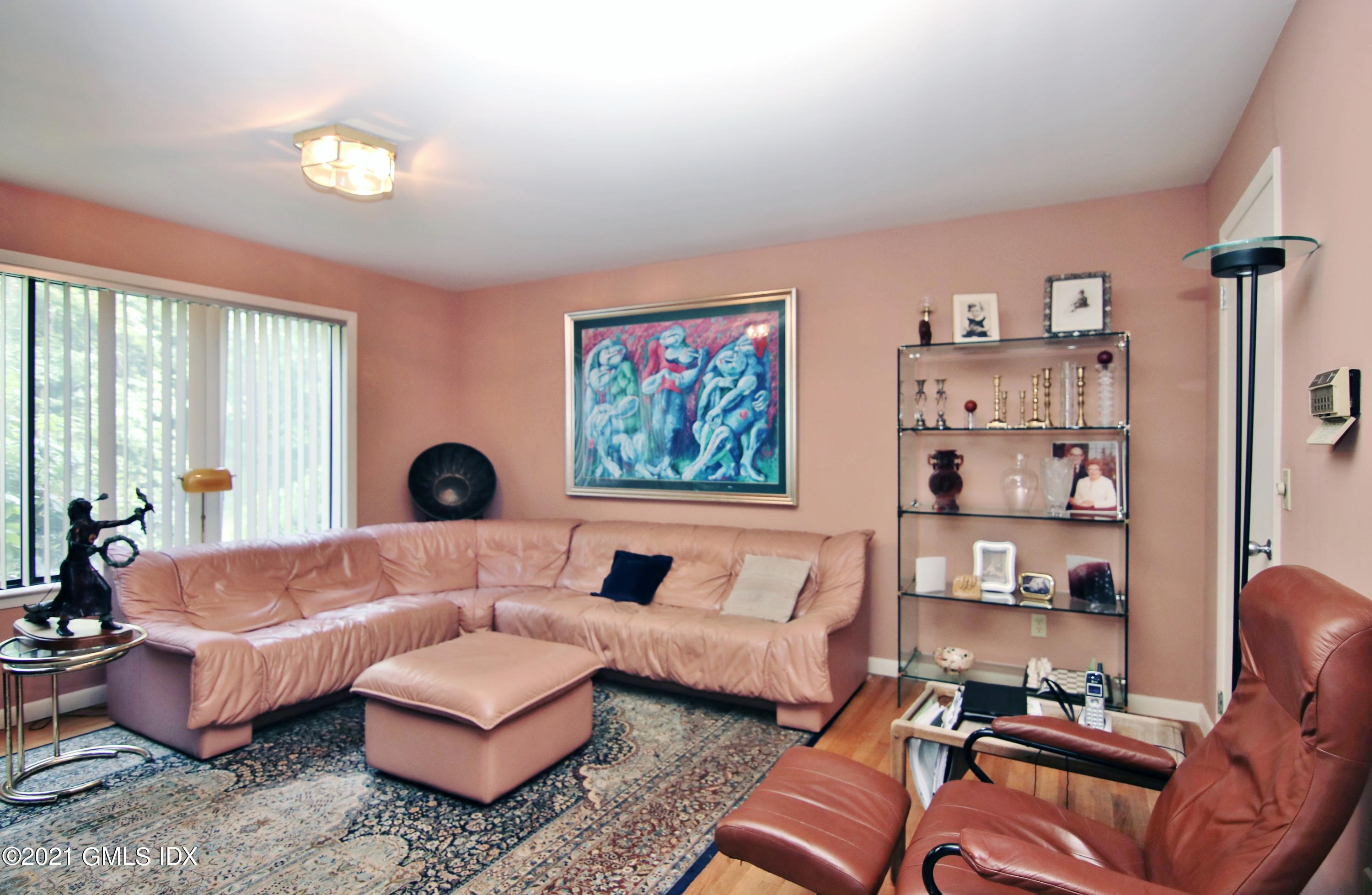 106 Gun Club Road Stamford, CT 06903 - Photo 17 of 38 a living room with furniture and a window
