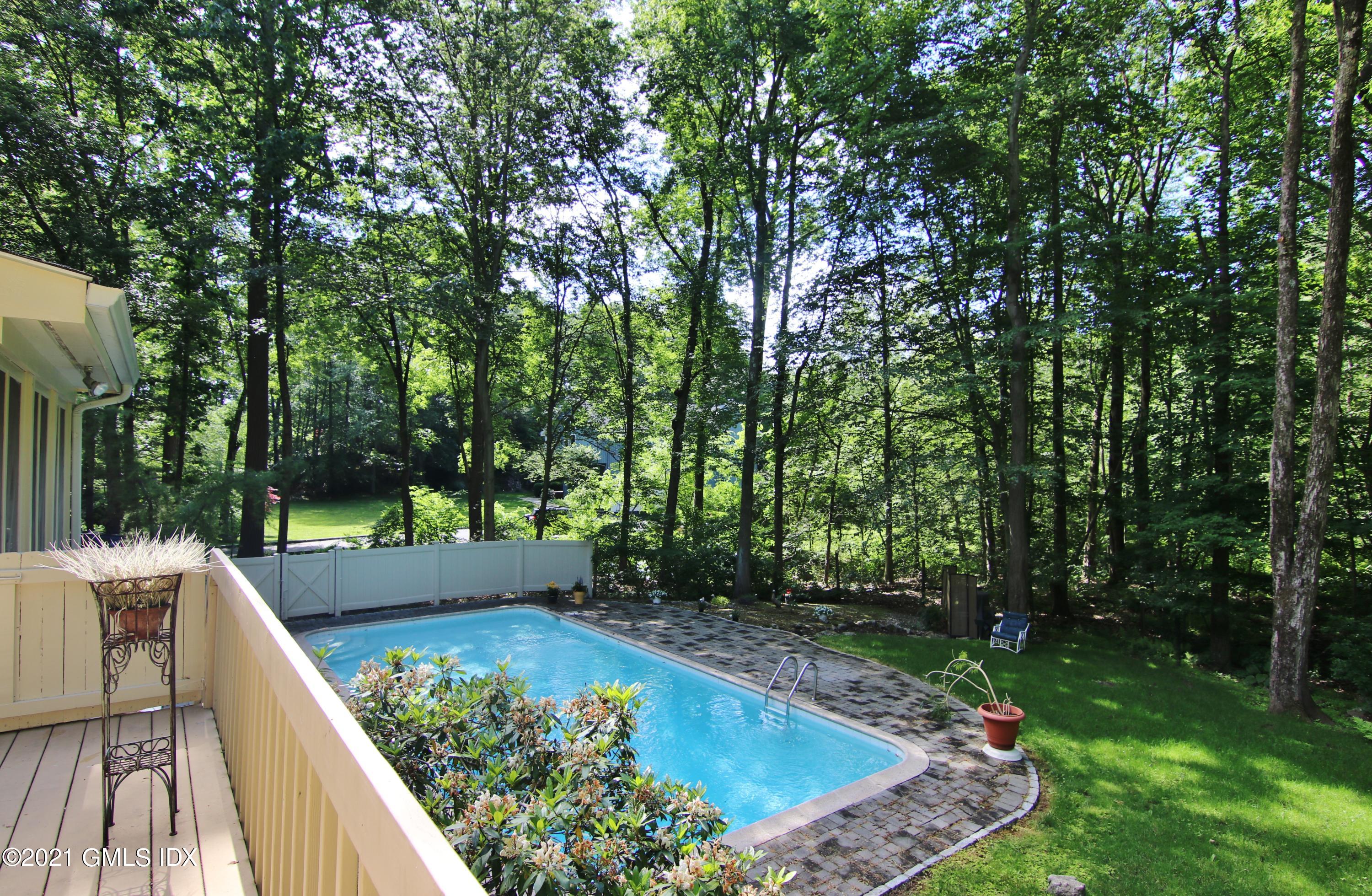 106 Gun Club Road Stamford, CT 06903 - Photo 36 of 38 a view of a backyard with sitting area