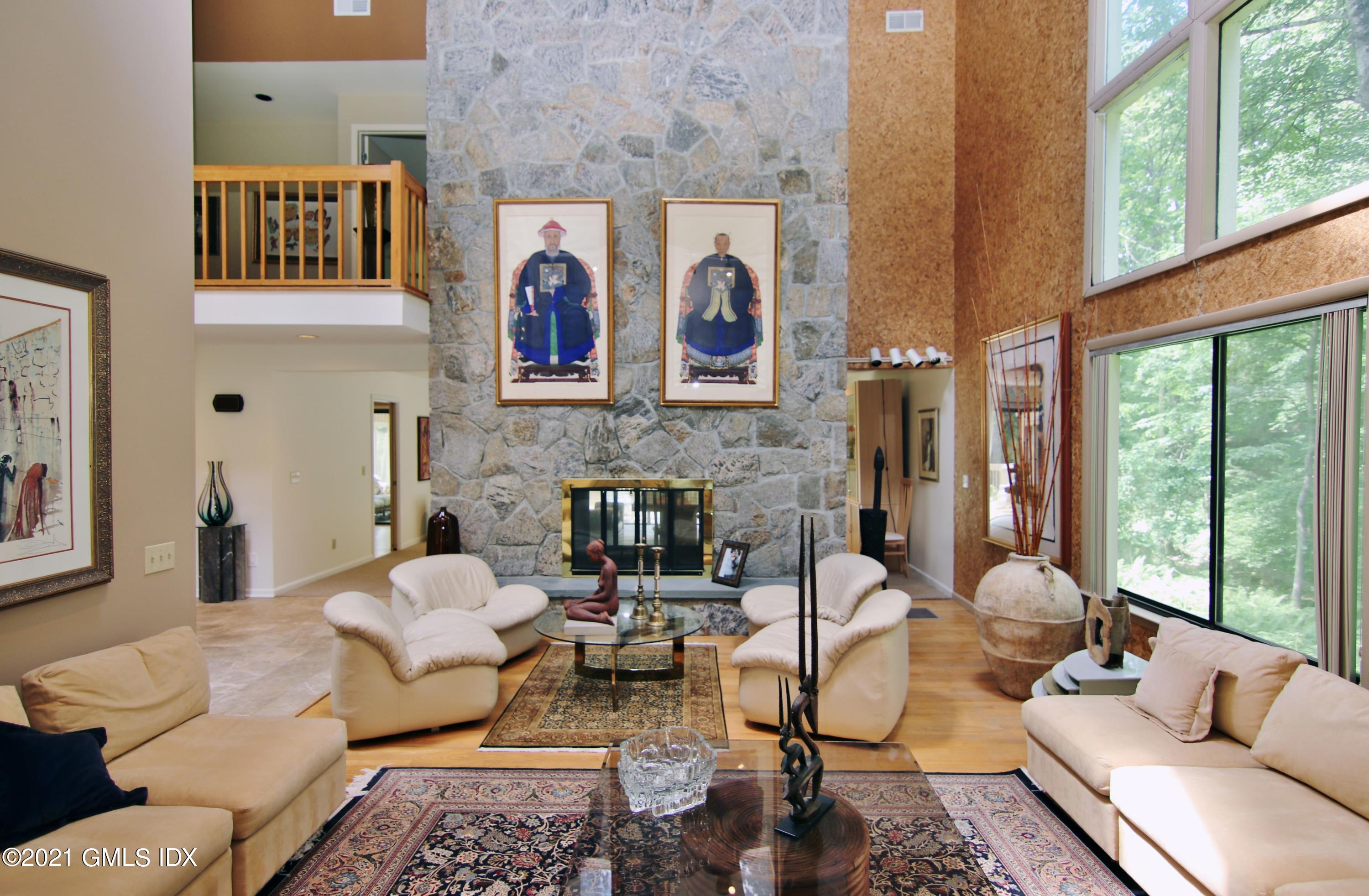 106 Gun Club Road Stamford, CT 06903 - Photo 7 of 38 a living room with furniture and a large window