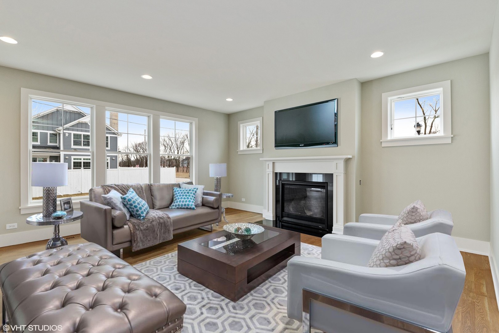 469 South Sunnyside Avenue Elmhurst, IL 60126 - Photo 12 of 37 a living room with furniture and a fireplace