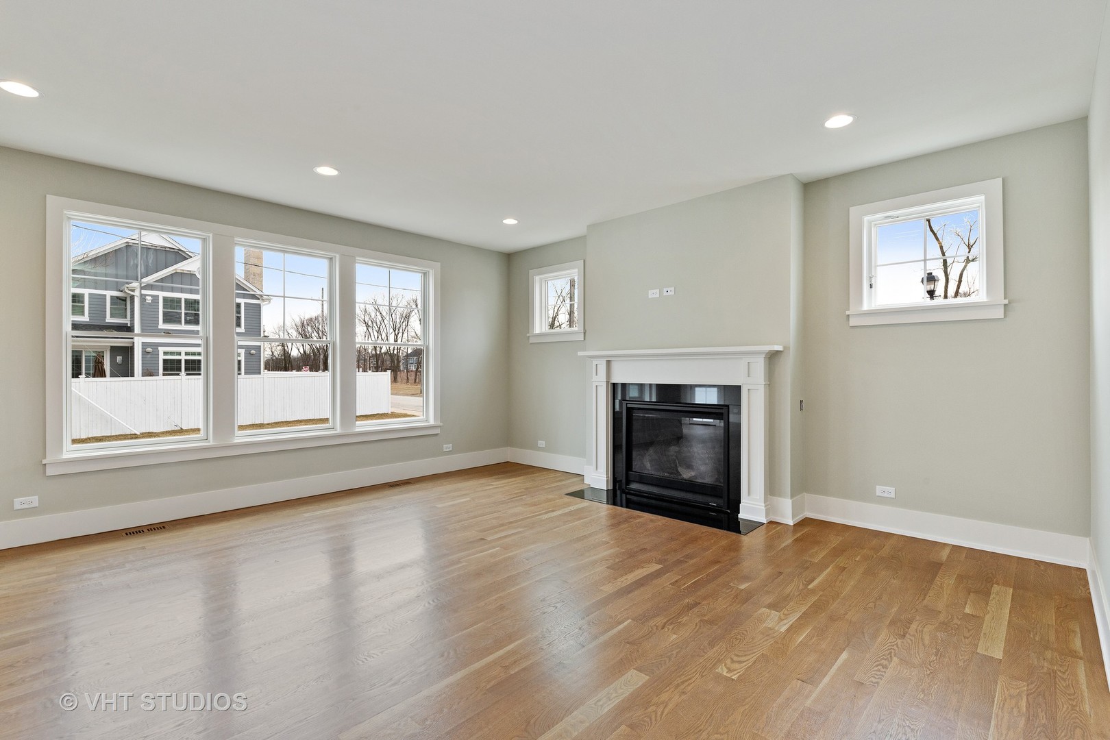 469 South Sunnyside Avenue Elmhurst, IL 60126 - Photo 13 of 37 a view of an empty room with a window and fireplace
