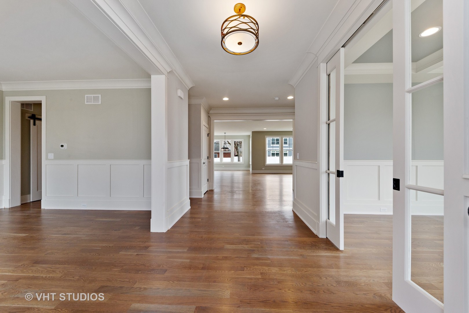 469 South Sunnyside Avenue Elmhurst, IL 60126 - Photo 3 of 37 a view of a hallway with wooden floor
