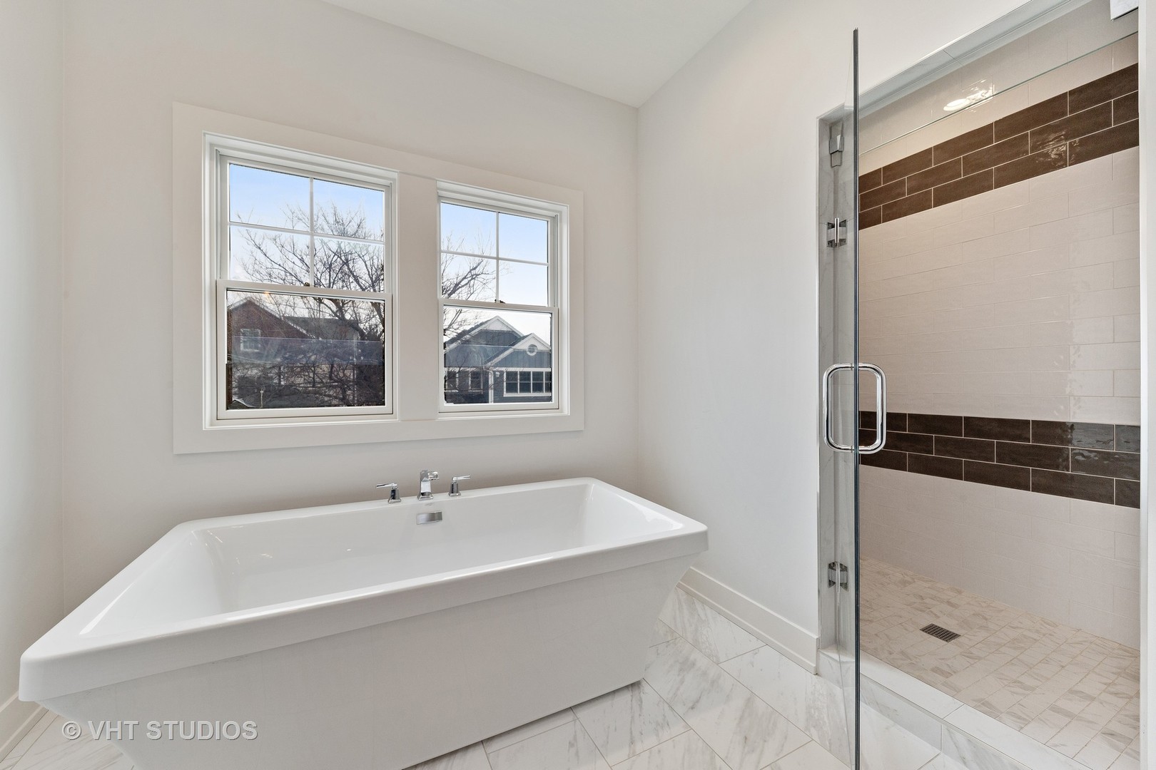 469 South Sunnyside Avenue Elmhurst, IL 60126 - Photo 22 of 37 a bathroom with a bathtub and a shower