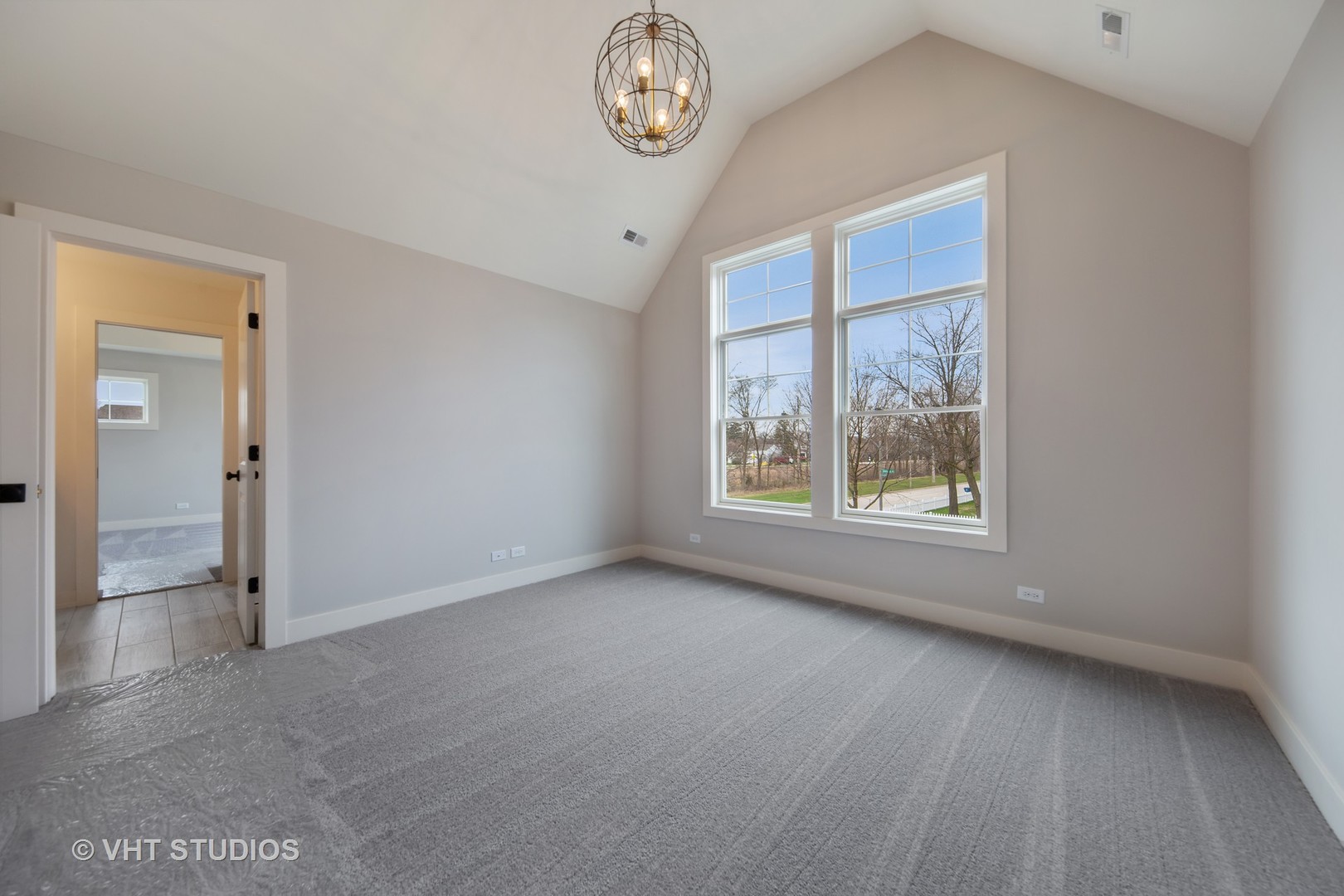 469 South Sunnyside Avenue Elmhurst, IL 60126 - Photo 24 of 37 an empty room with a window and a mirror