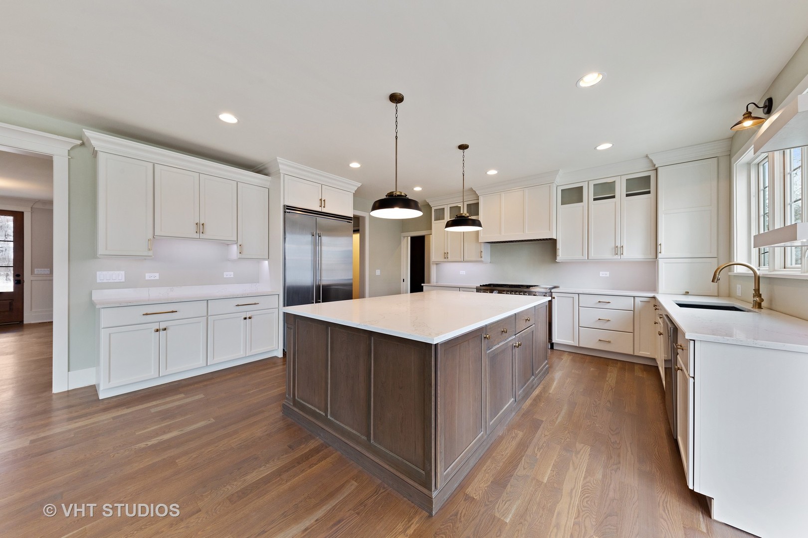 469 South Sunnyside Avenue Elmhurst, IL 60126 - Photo 6 of 37 a kitchen with stainless steel appliances a sink stove and cabinets