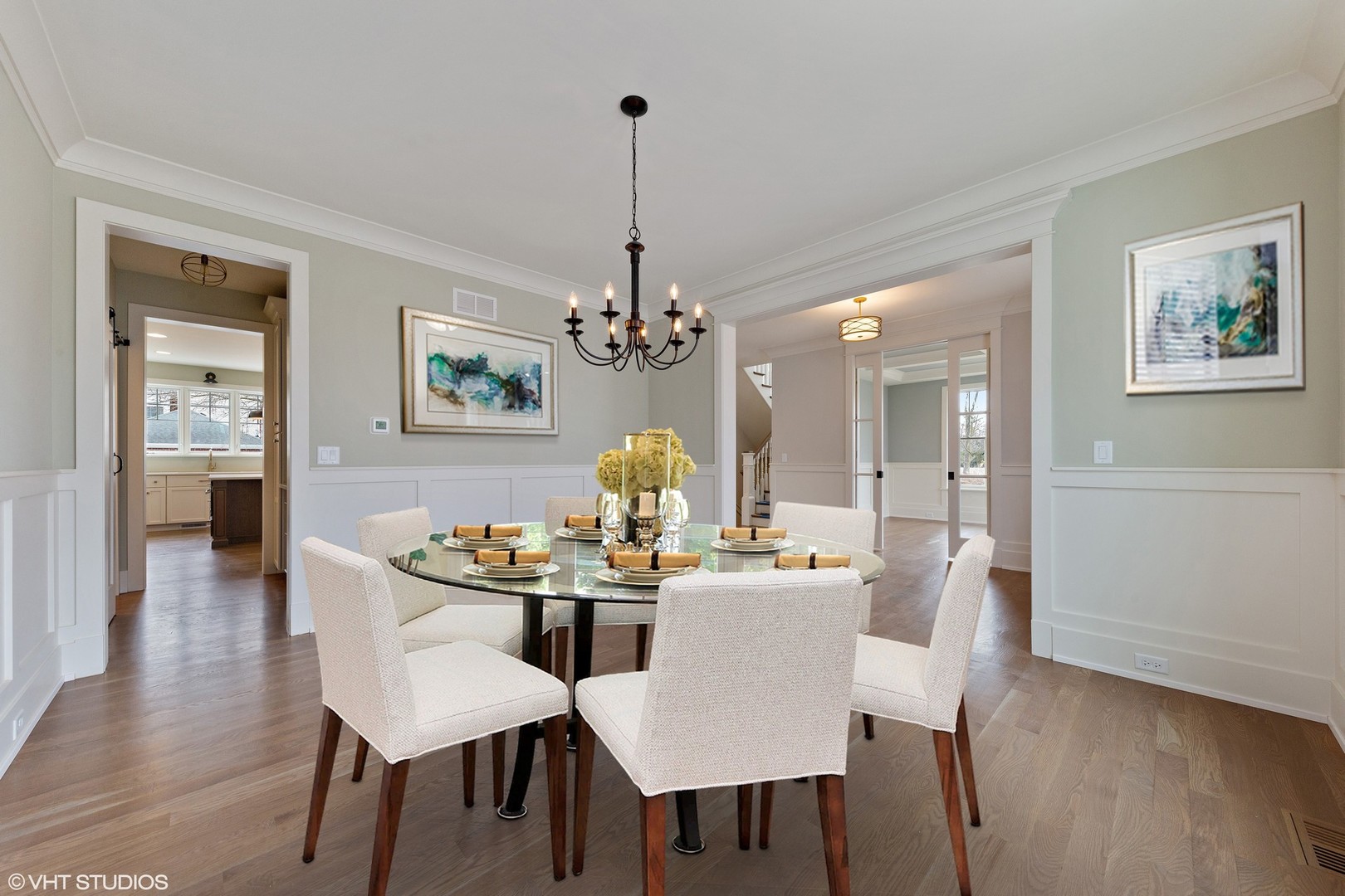 469 South Sunnyside Avenue Elmhurst, IL 60126 - Photo 10 of 37 a dining room with furniture a chandelier and wooden floor