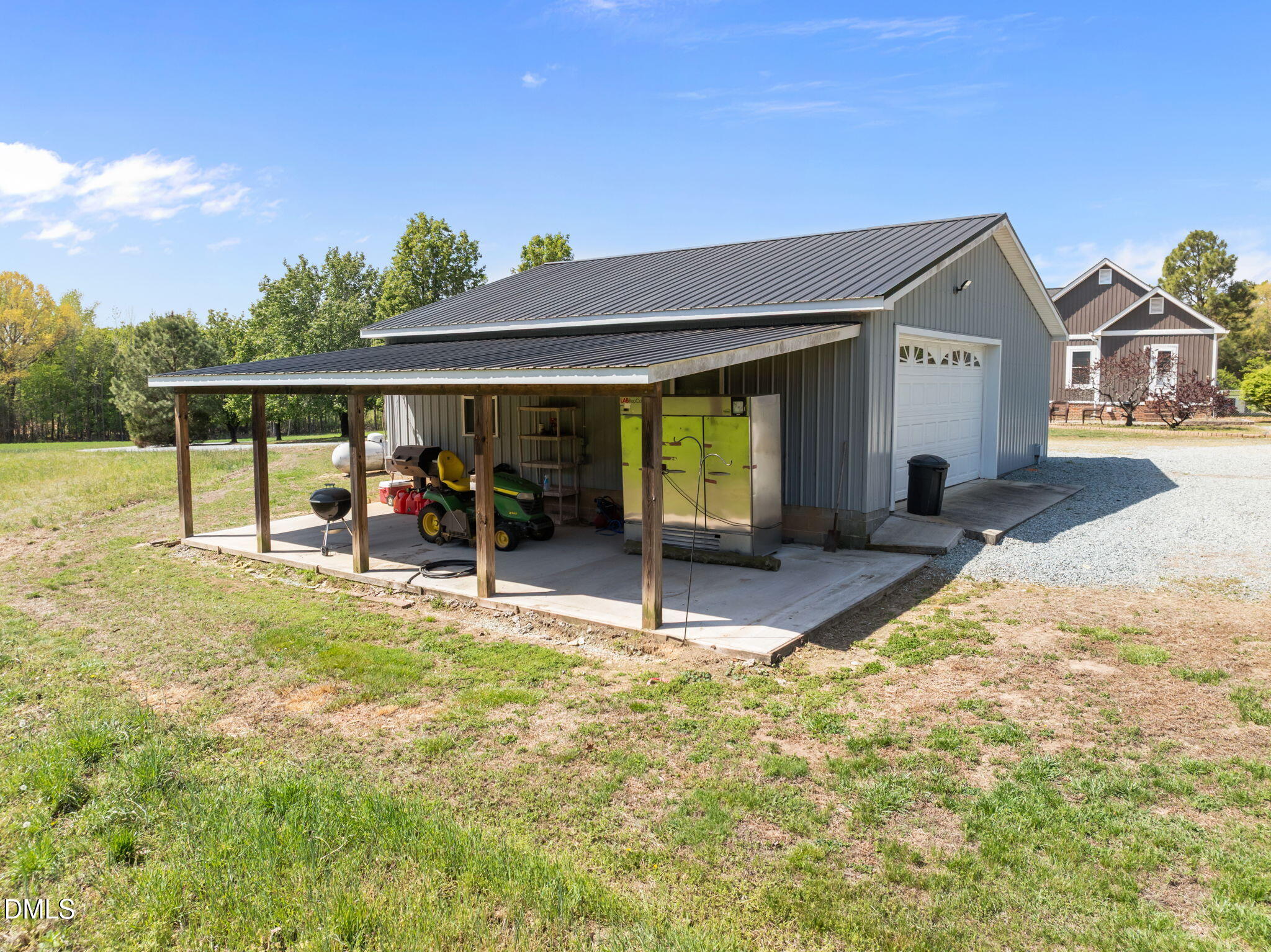 236 Dirgie Mine Road Roxboro, NC 27574 - Photo 41 of 55 a view of a house with a outdoor space