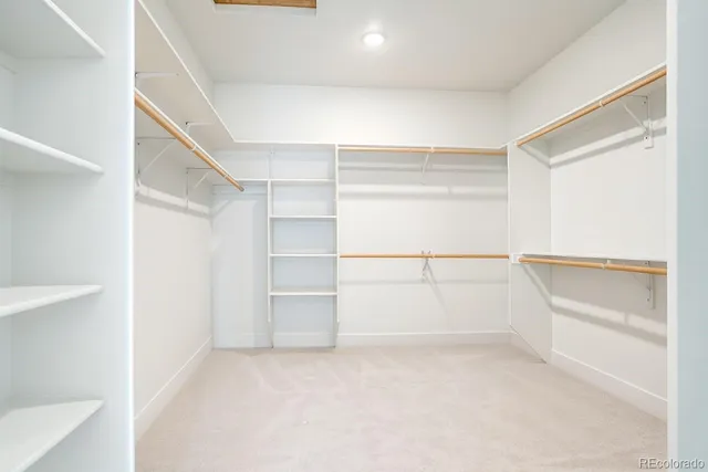 a view of an empty walk in closet