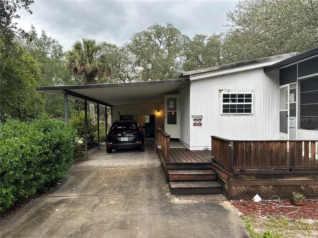 a view of a back yard of the house