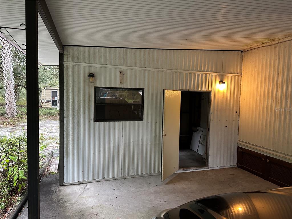 10625 Northeast 153 Street Fort McCoy, FL 32134 - Photo 7 of 7 a view of a livingroom and a hallway