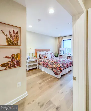 a bedroom with a bed and a cabinets