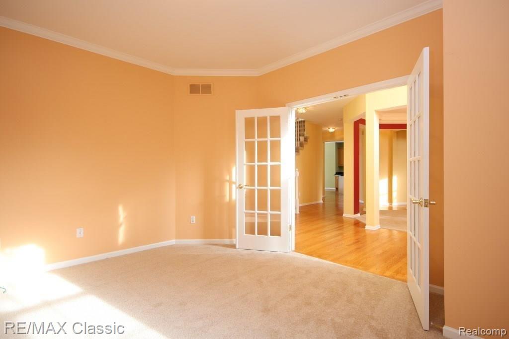 47790 Pavillon Road Canton, MI 48188 - Photo 27 of 45 Double French door entry to the den or office.