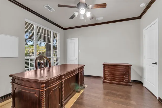 a kitchen with stainless steel appliances granite countertop a stove and a refrigerator