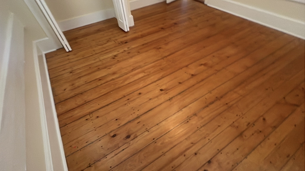 10 Centennial Place, Unit 2 Framingham, MA 01701 - Photo 11 of 12 a view of wooden floor