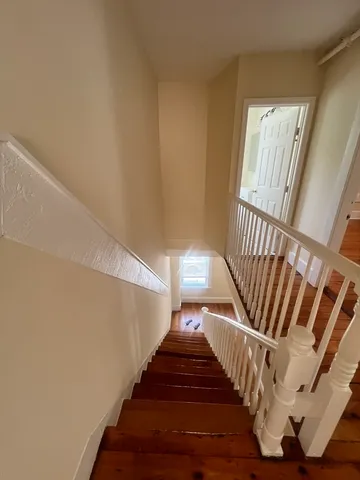a view of entryway with wooden floor
