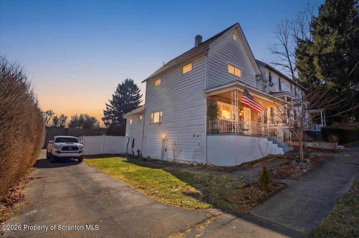 227 Reese Street Scranton, PA 18508 - Photo 1 of 56 a backyard of house with a yard and outdoor seating