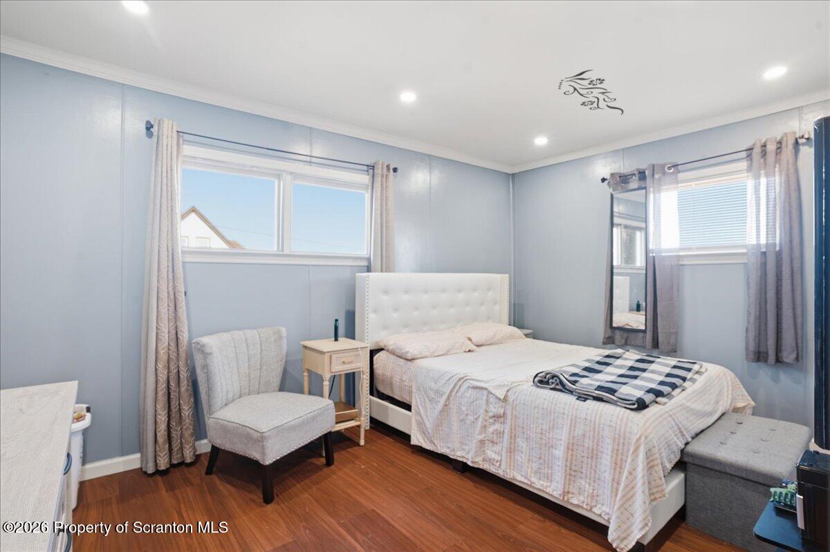 227 Reese Street Scranton, PA 18508 - Photo 23 of 56 a bedroom with a bed and a couch