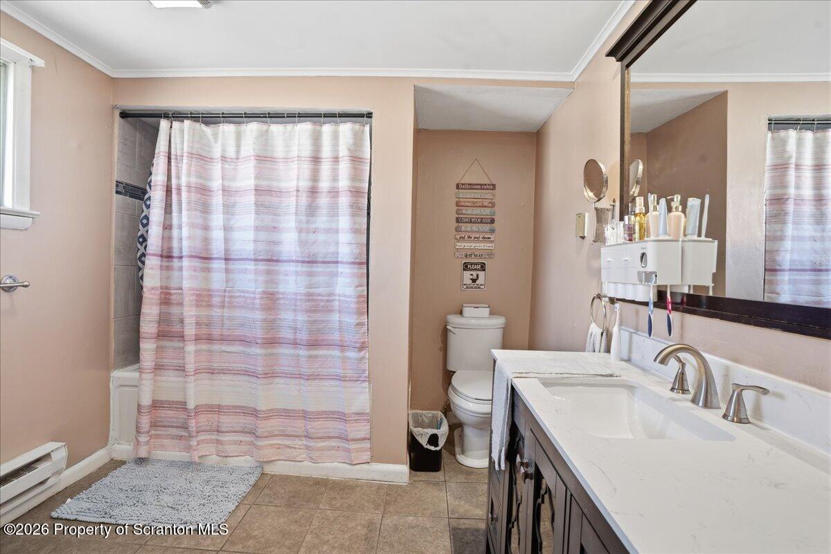 227 Reese Street Scranton, PA 18508 - Photo 27 of 56 a bathroom with a sink a toilet and shower