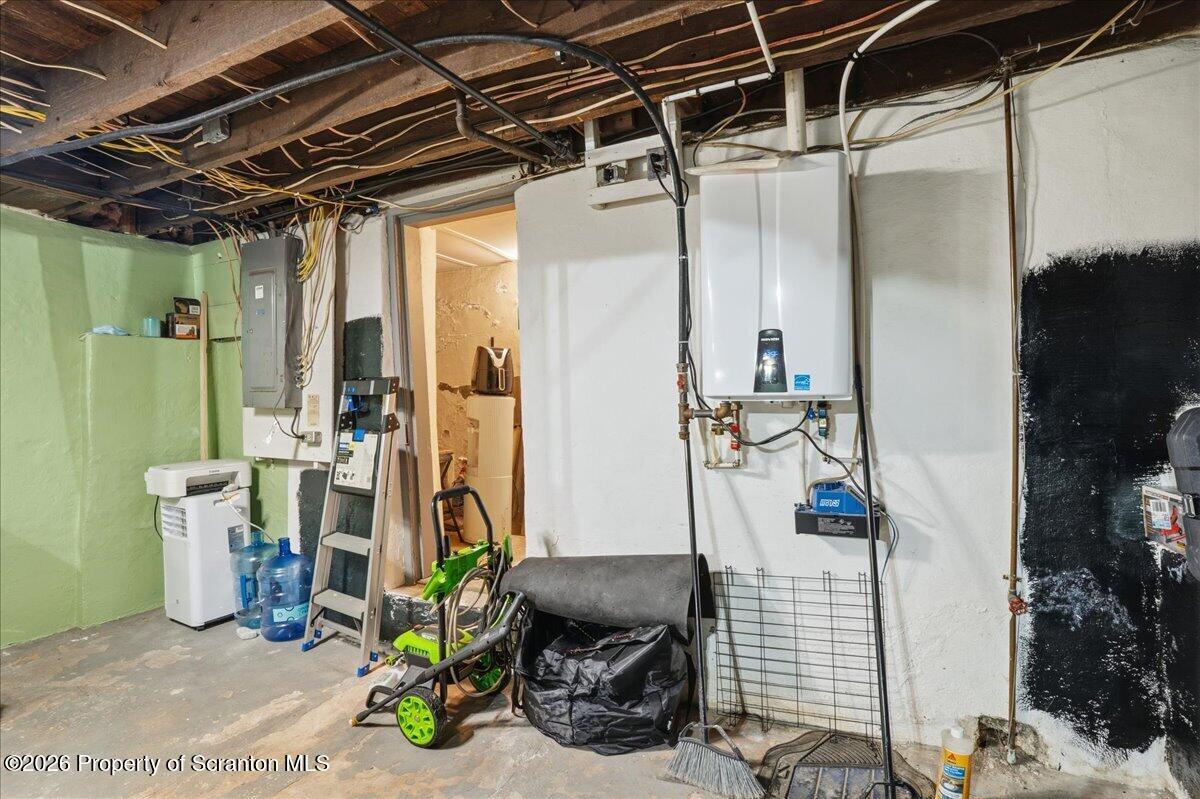 227 Reese Street Scranton, PA 18508 - Photo 38 of 56 a view of walk in closet with clothes and shoes