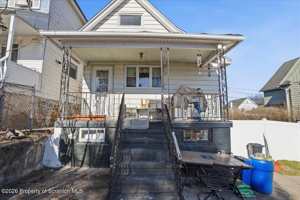 227 Reese Street Scranton, PA 18508 - Photo 43 of 56 a front view of a house with outdoor seating