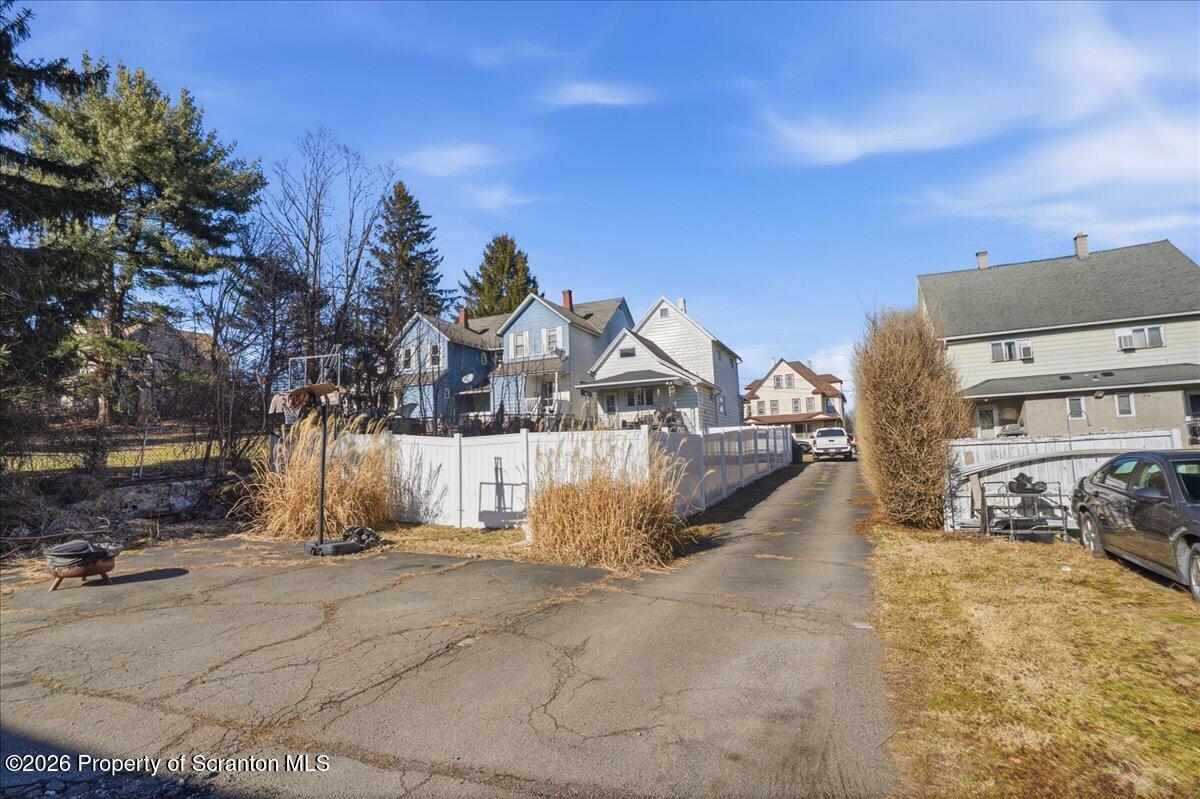 227 Reese Street Scranton, PA 18508 - Photo 46 of 56 a view of a house with snow on the road