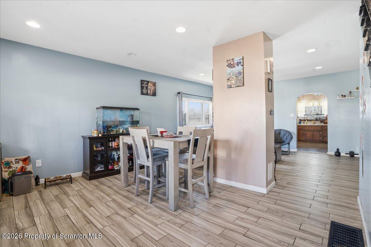 227 Reese Street Scranton, PA 18508 - Photo 7 of 56 a view of a dining room with furniture and wooden floor