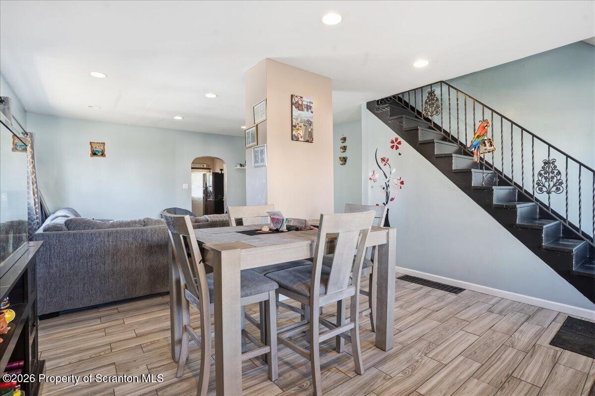 227 Reese Street Scranton, PA 18508 - Photo 8 of 56 a view of a livingroom with furniture and wooden floor
