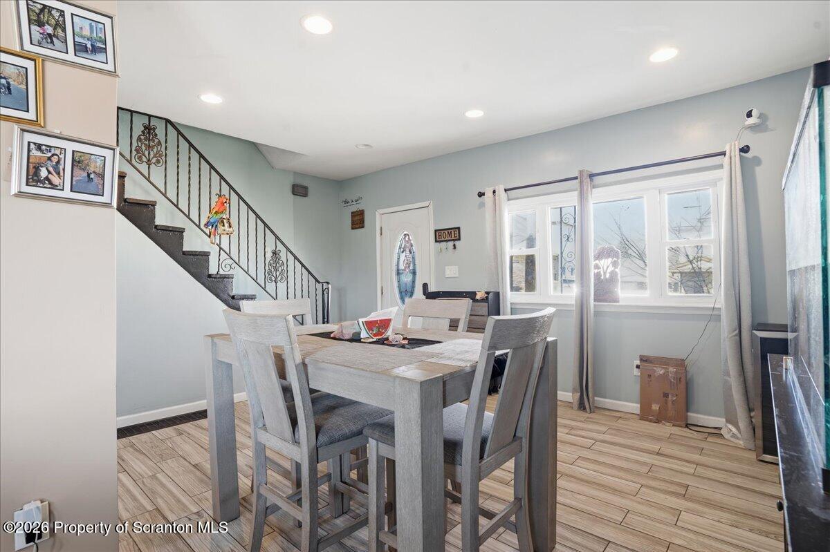227 Reese Street Scranton, PA 18508 - Photo 10 of 56 a view of a dining room with furniture and a chandelier