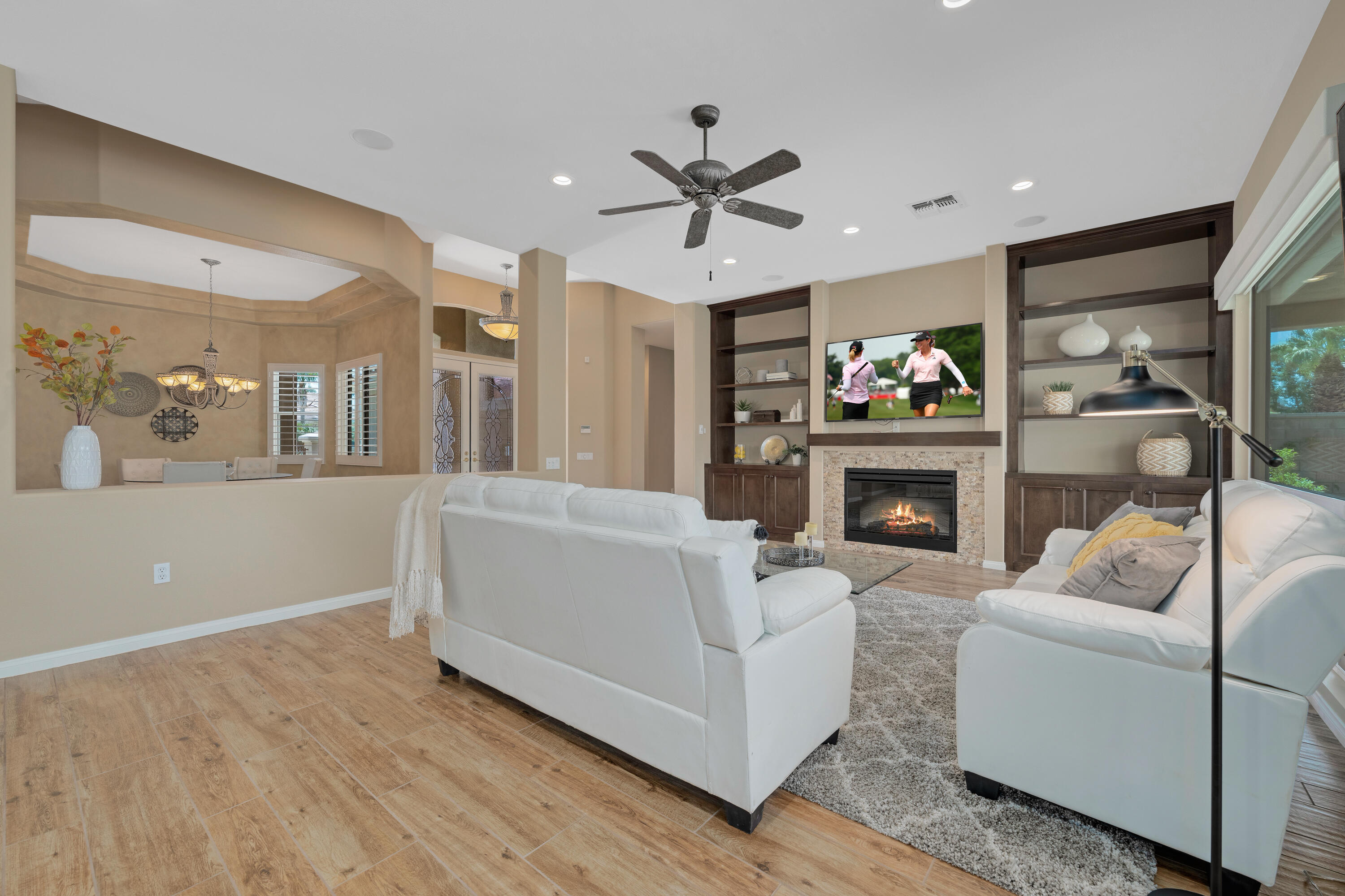 35691 Talus Lane Palm Desert, CA 92211 - Photo 14 of 39 a living room with furniture and a fireplace