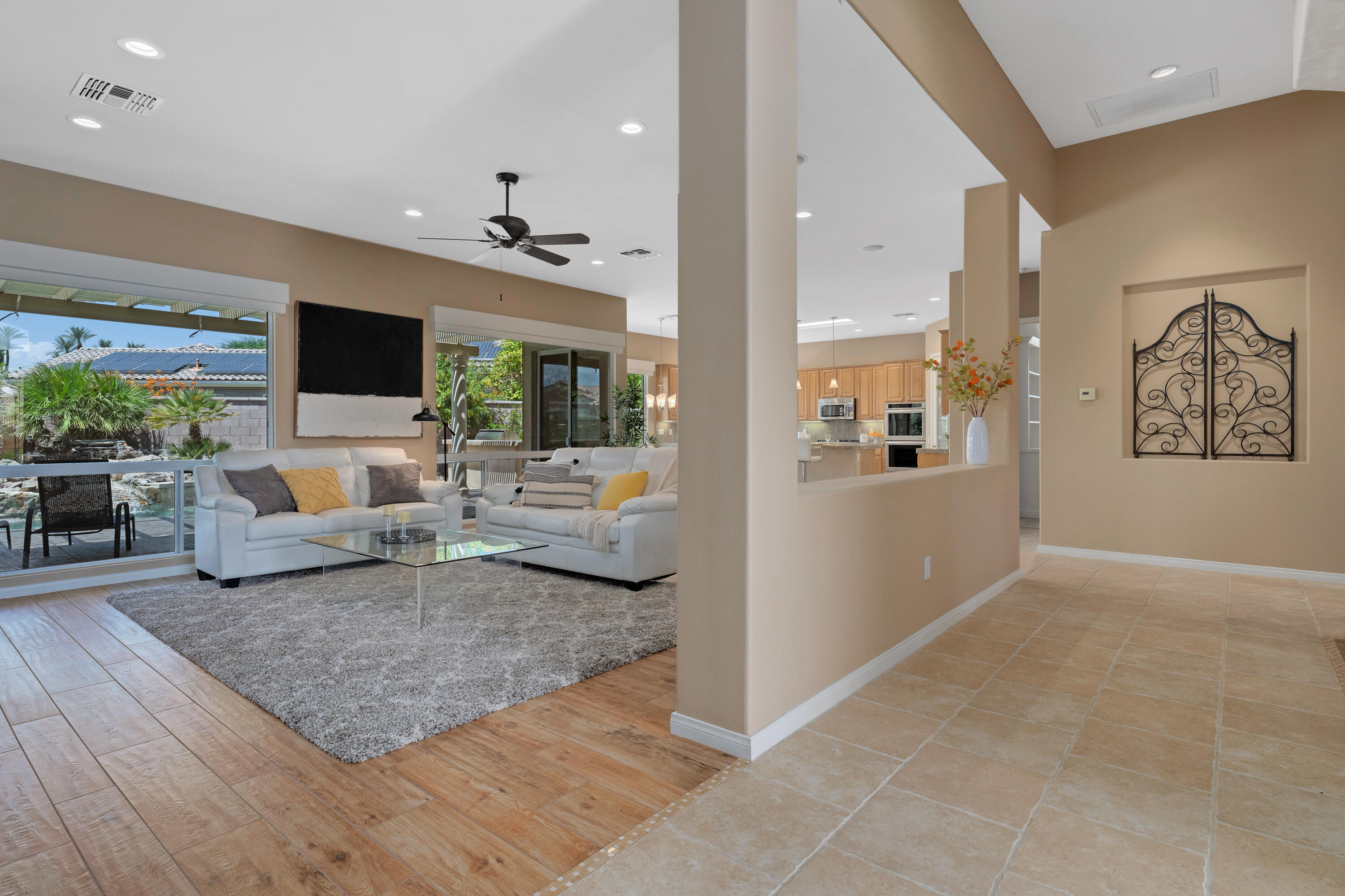 35691 Talus Lane Palm Desert, CA 92211 - Photo 16 of 39 a living room with furniture and a flat screen tv