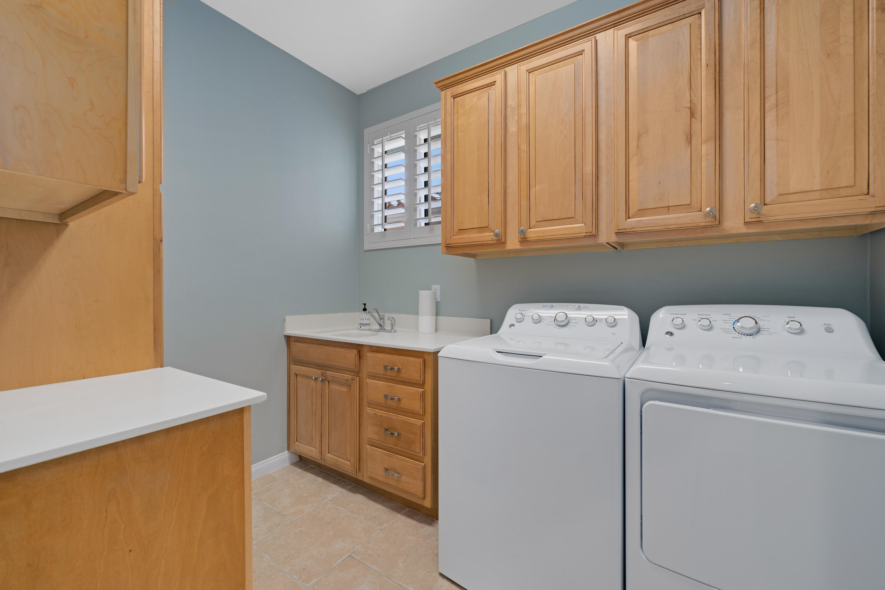 35691 Talus Lane Palm Desert, CA 92211 - Photo 33 of 39 a utility room with dryer and washer