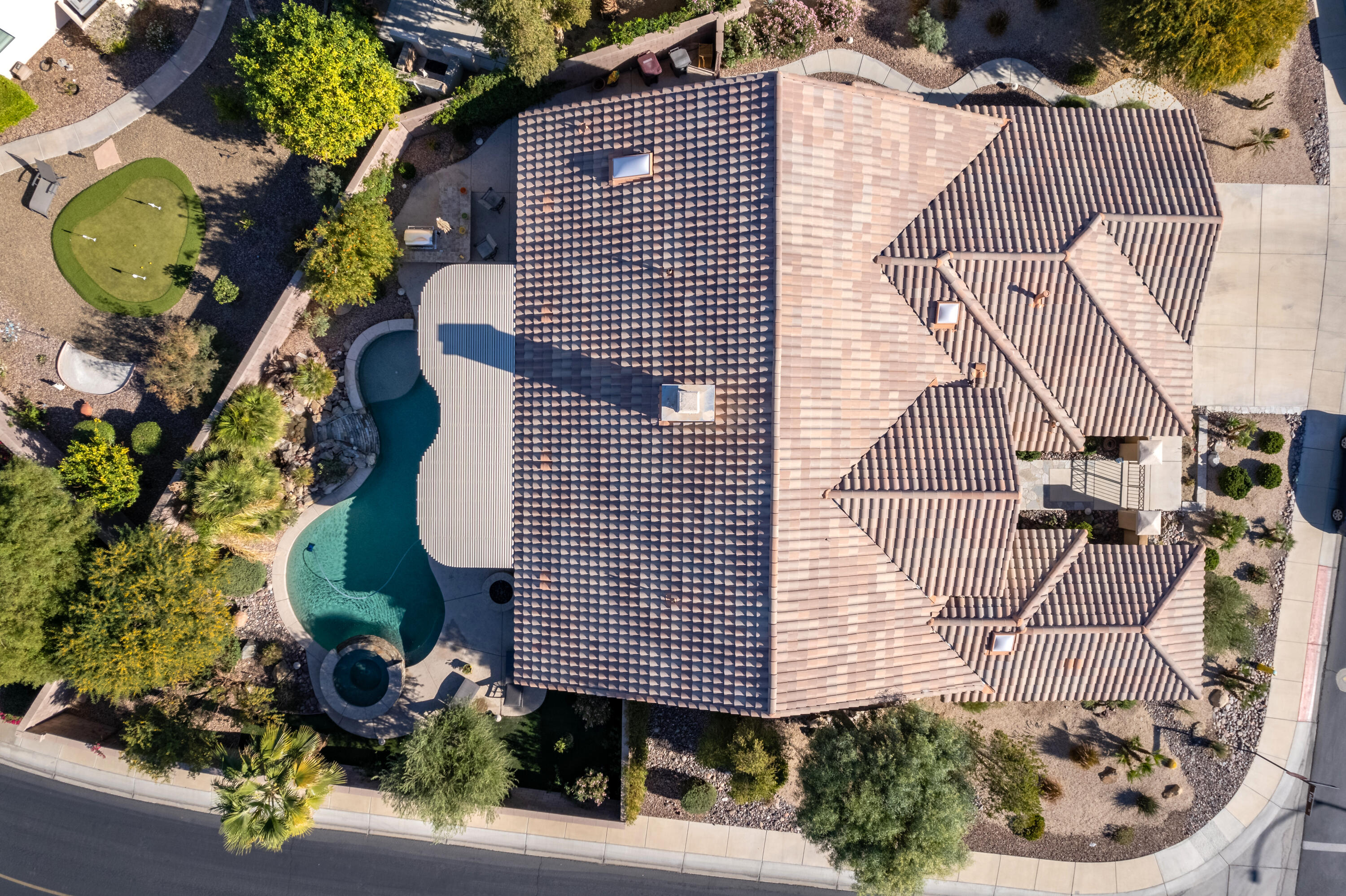 35691 Talus Lane Palm Desert, CA 92211 - Photo 35 of 39 a front view of a house with a garden