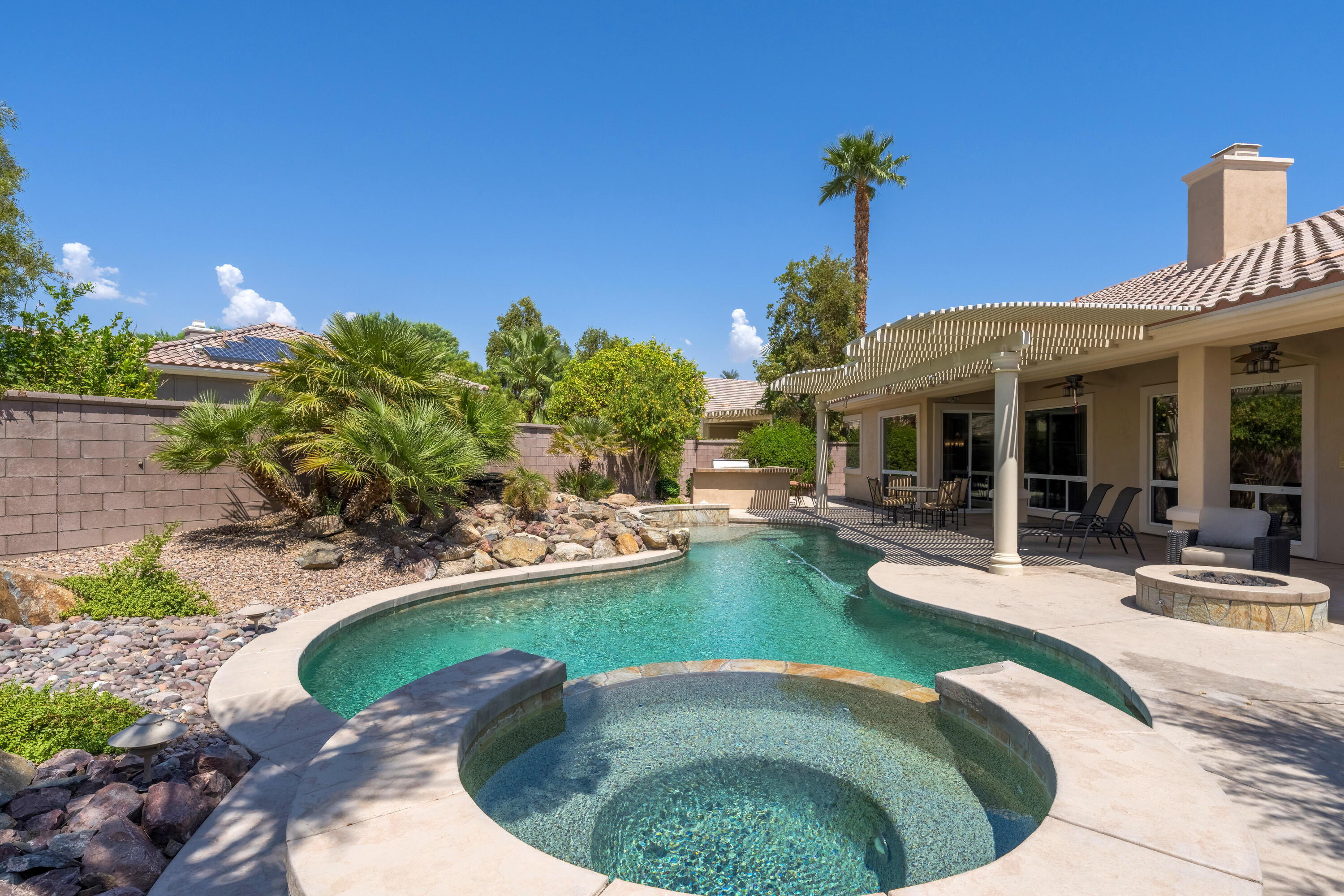 35691 Talus Lane Palm Desert, CA 92211 - Photo 9 of 39 a view of a house with swimming pool