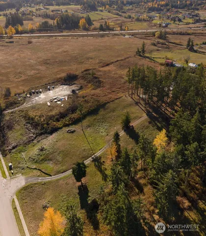 a aerial view of a yard with wooden fence