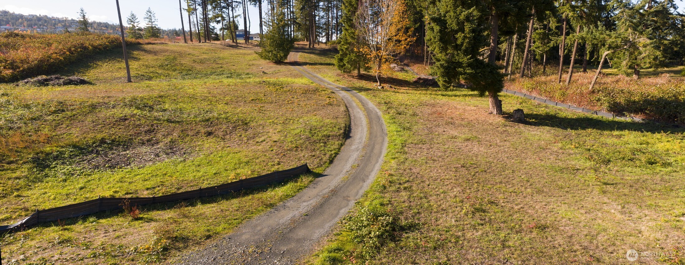 391 Keeler Road Sequim, WA 98382 - Photo 2 of 25 a view of a yard with wooden fence