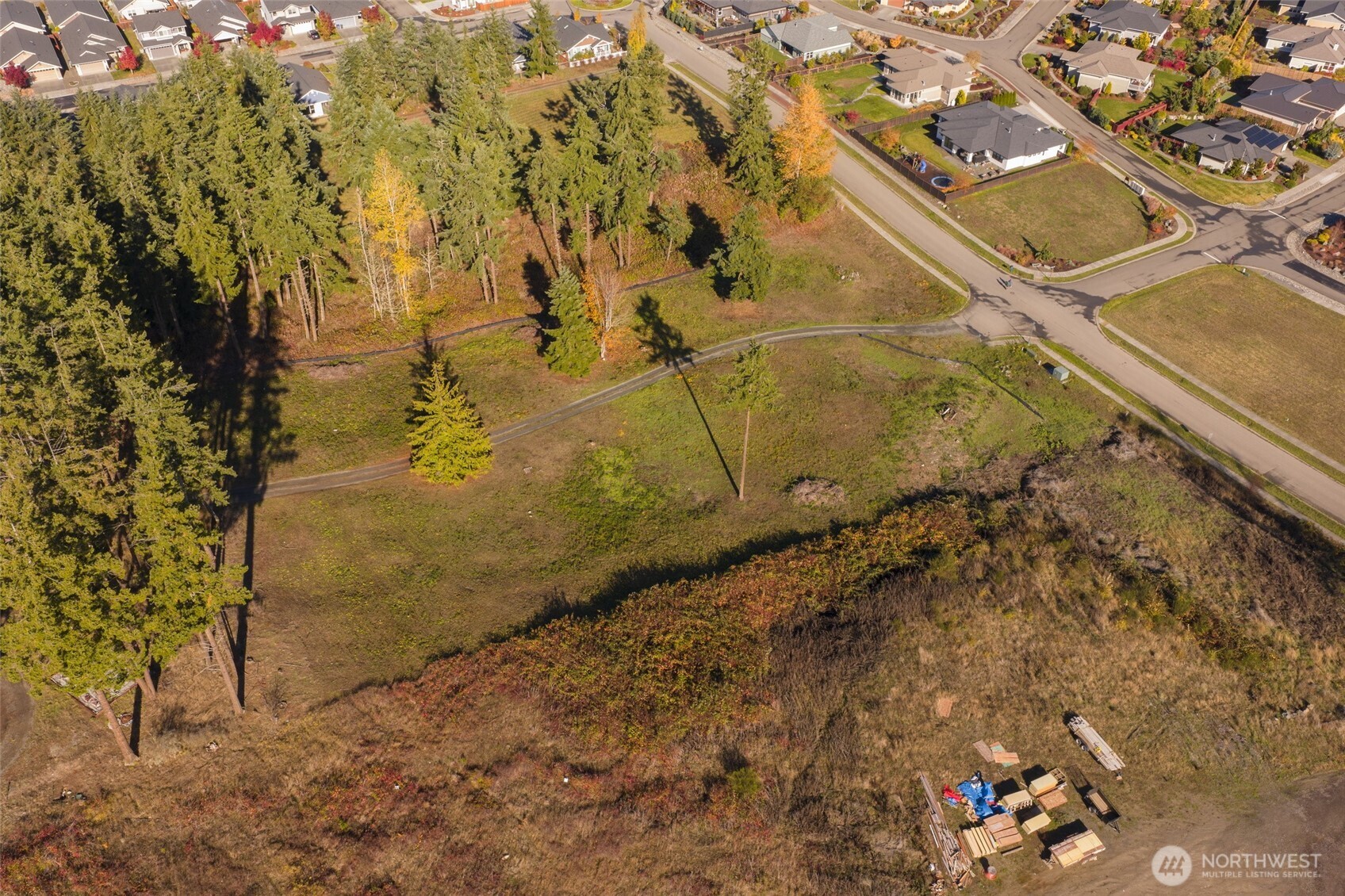 391 Keeler Road Sequim, WA 98382 - Photo 21 of 25 a aerial view of a yard with wooden fence